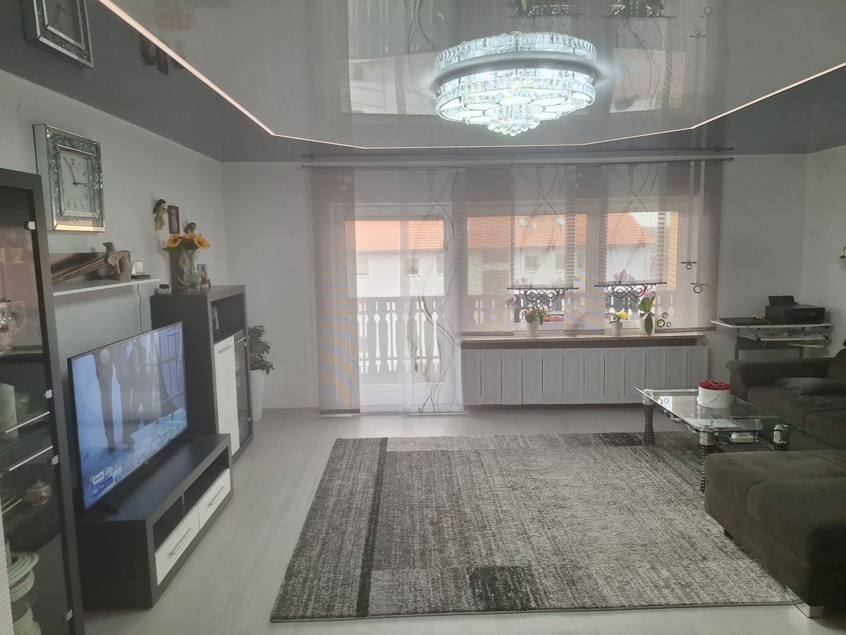 Eigennutzung oder Kapitalanlage charmante, sonnige und großzügige 3 Zimmer Eigentumswohnung mit Balkon und Garten